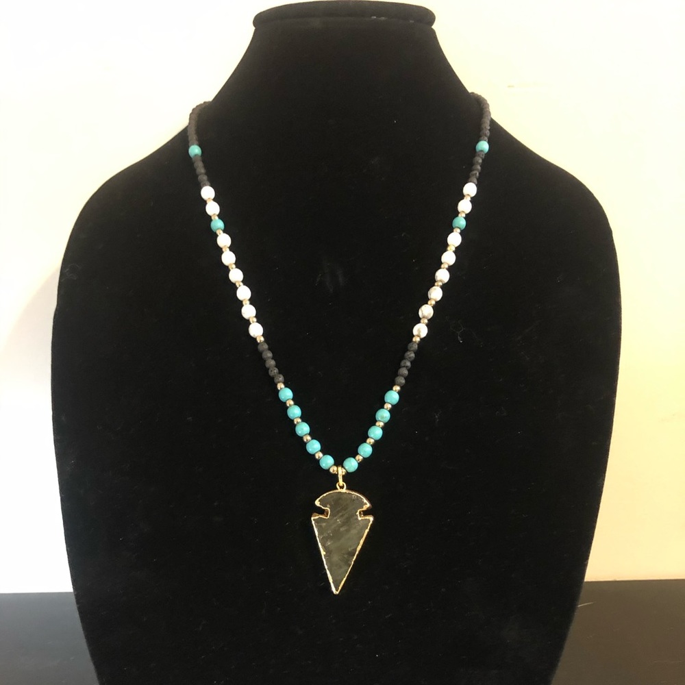 Quartz arrowhead pendant with black lava beads, turquoise & white howlite beads